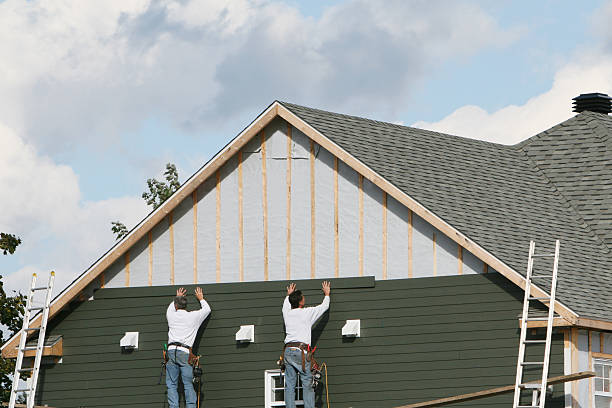Professional Siding technician working in Colfax, NC
